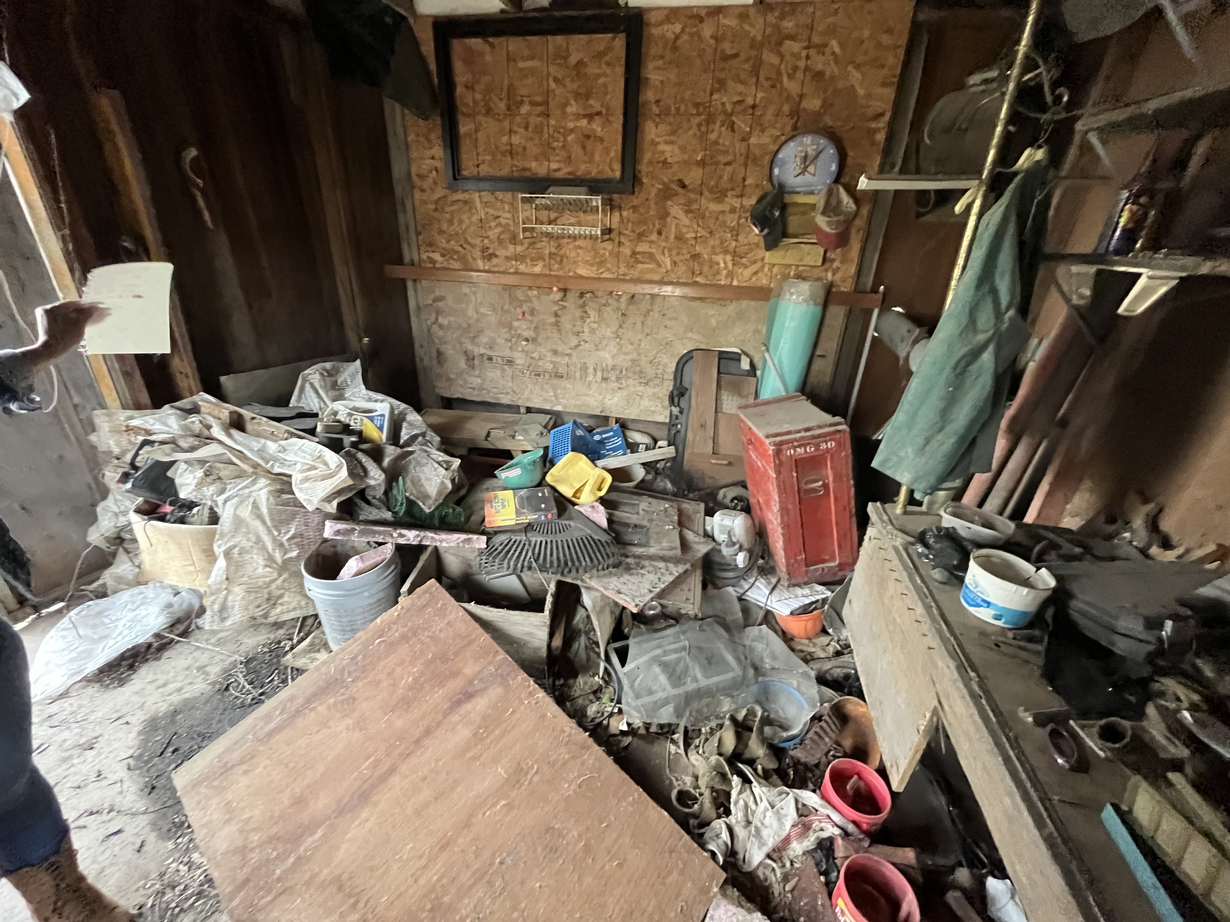 Before garage cleanout by Dakota Cleanout