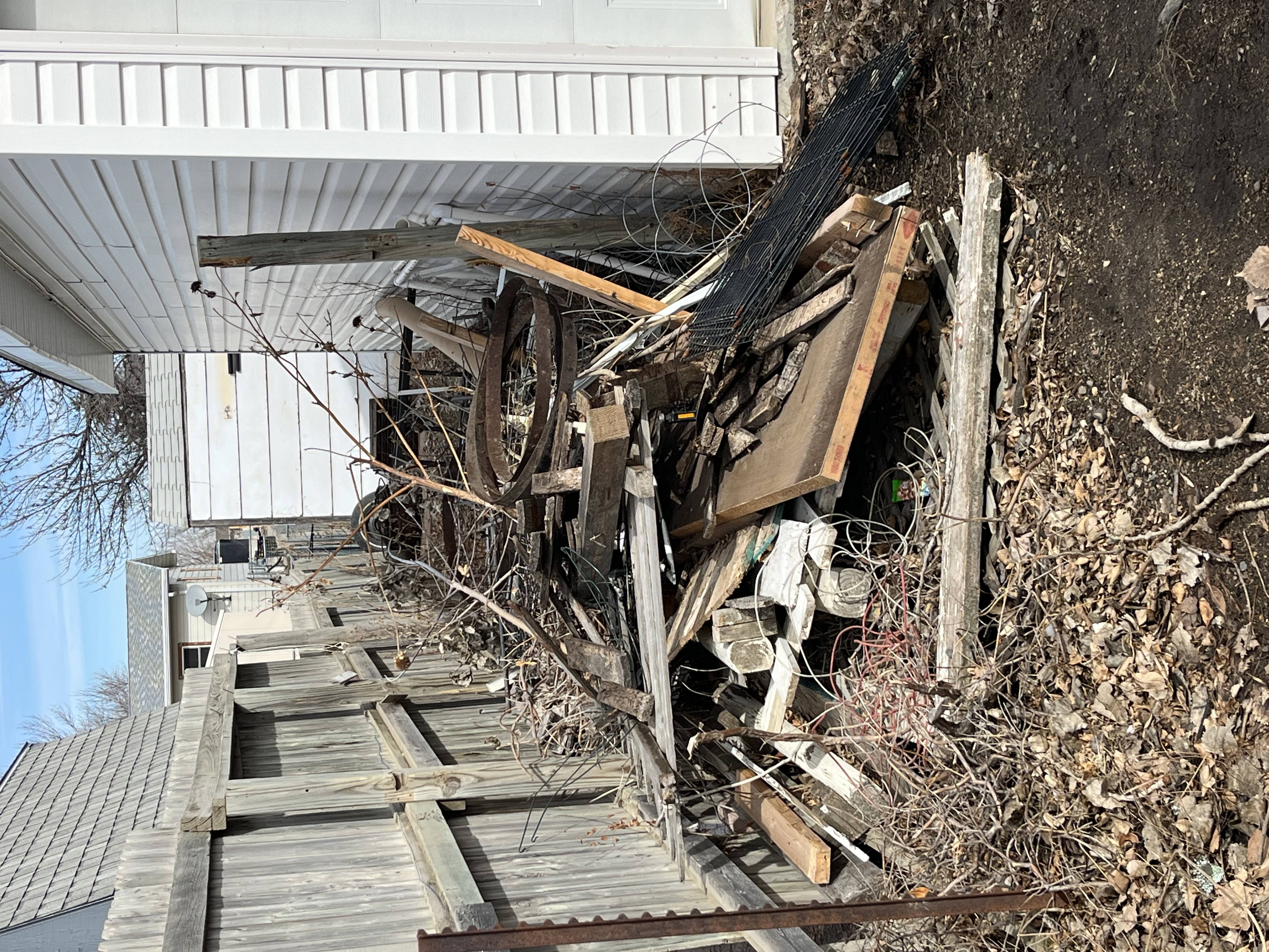 Before yard cleanup by Dakota Cleanout