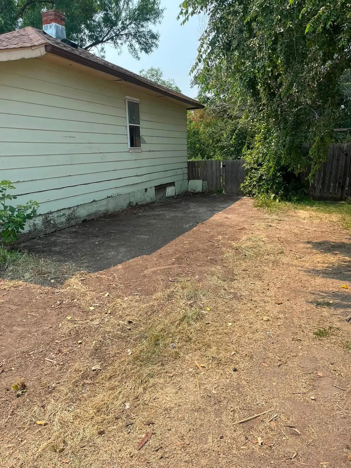 Exterior property cleanup after Dakota Cleanout work